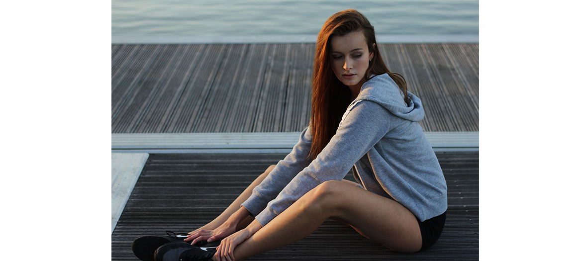 Young woman exercising outside