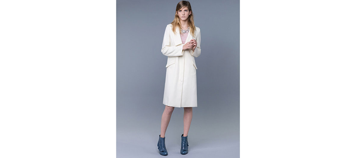 Oversized cream-colored coat by Sisley 