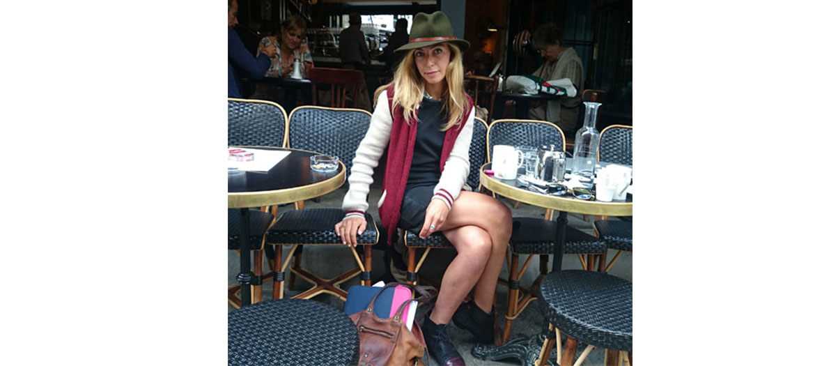 Amélie Etasse sitting outside a cafe for our interview