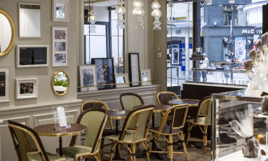 Interior atmosphere and decoration of the Michel Cluizel Tea Room with paintings, chocolates, caramels, pralines