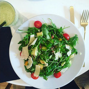 veggie salad with avocado, boulgour, quinoa, arugula and orange vinaigrette