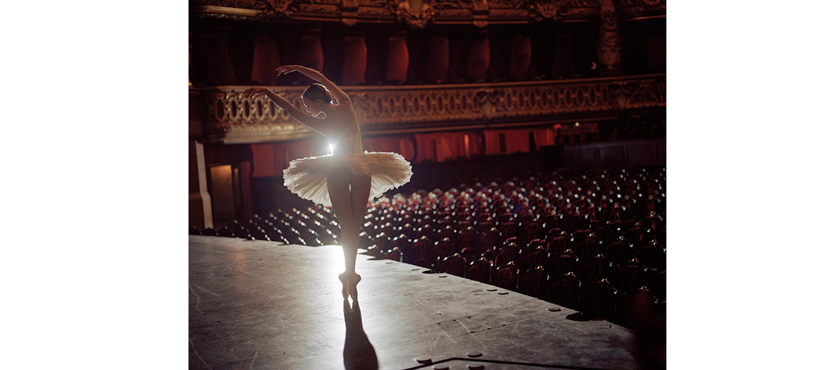Juliette Gernez dancing on the stage of the Opéra Garnier