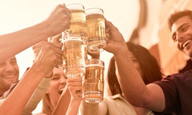 Friends cheers with beer