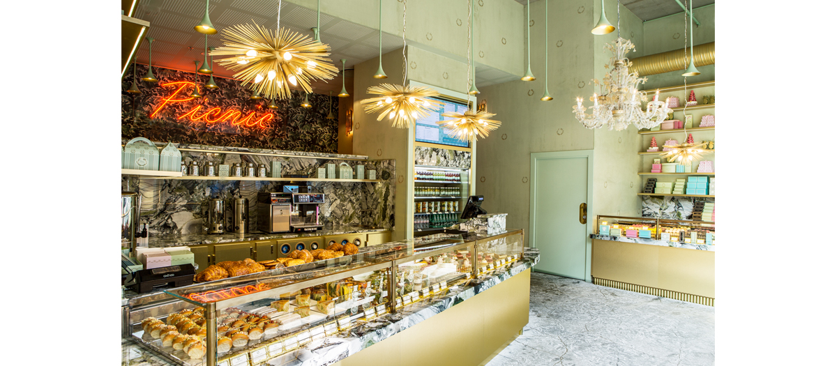 Display of finger sandwiches with salmon, niçoise salads, quinoa, wild herbs and vegetables from the Picnic Laduree restaurant