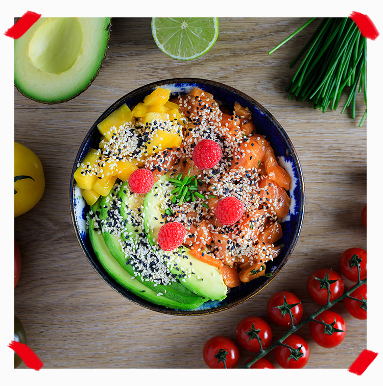 Pokawa poke bowl with salmon, mango, avocado, carot, rice and raspberry