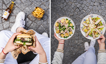 Burger with fries, beef and potato salad dish, arugula