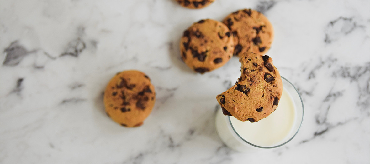 Cookies with white chocolates, red berries and choco-hazelnuts