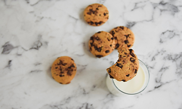 Cookies with white chocolates, red berries and choco-hazelnuts