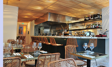  Indoor atmosphere and bar of the Supernova Italian Restaurant in the Marais