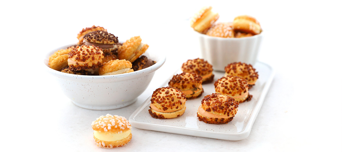 Bowls of tropezienne mini pies with natural flavors, chocolate, coffee, hazelnut