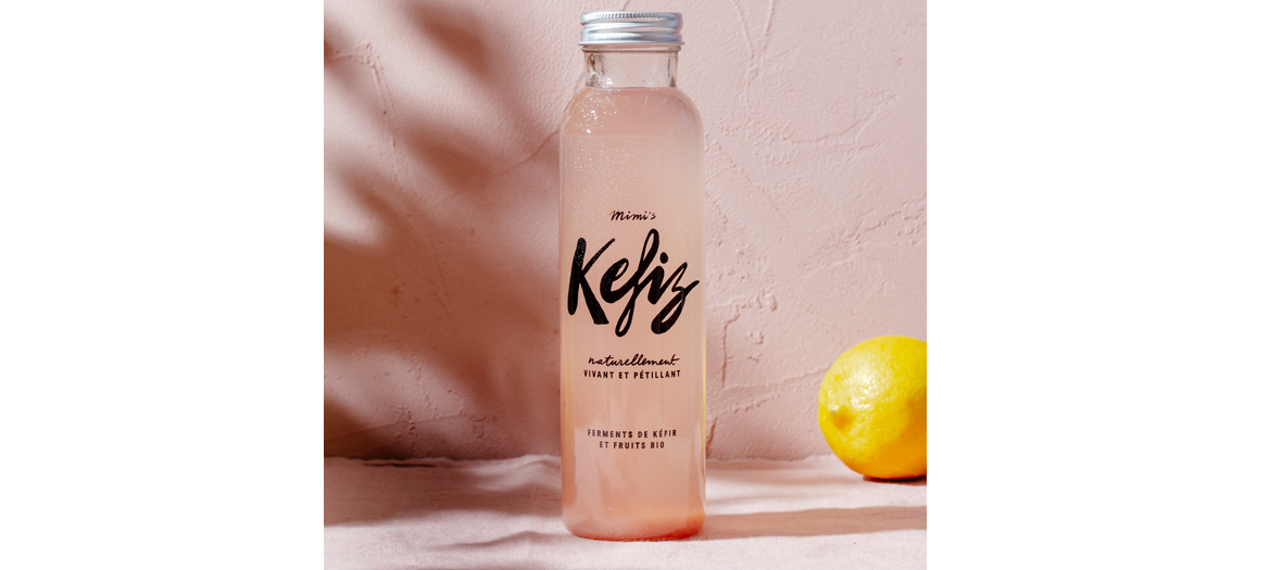 Bottle of Kefir with lemon beside