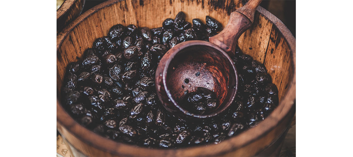  Bowl of black olives at street food