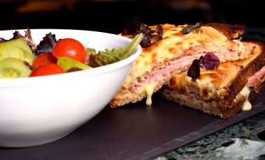 The Croque Monsieur with grated truffle and grated gruyère cheese and a bowl of Juliette's chef Juliette's salad