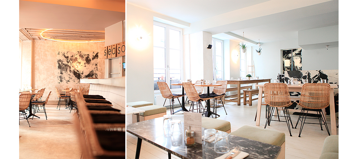 Décoration de la salle du restaurant Season avec des chaises en rotin et table en bois