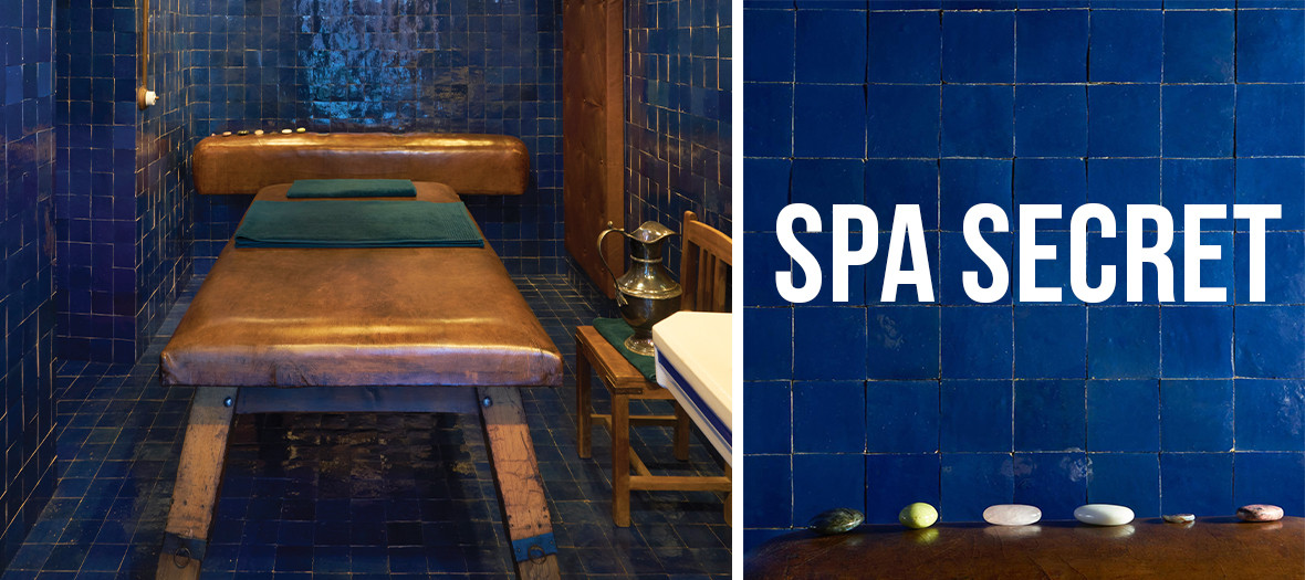 cabin massage with Blue tiles, leather table, an incredible composition of dried flowers on the ceiling, sound track signed Jean-Sébastien Bachand candles to embalm the atmosphere with an almost monastic fragrance at Officine Buly in Paris
