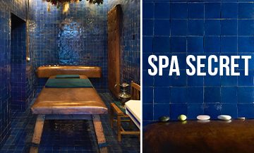 Cabine de massage avec Faïence bleue, table en cuir, savons, huiles et produits de beauté naturels à l’Officine Buly