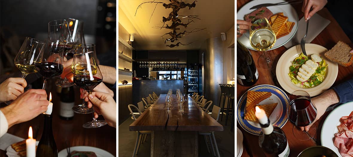 Une table conviviale du restaurant Les Amoureuses à Paris, parfait pour partager un bon vin et un repas en toute simplicité.