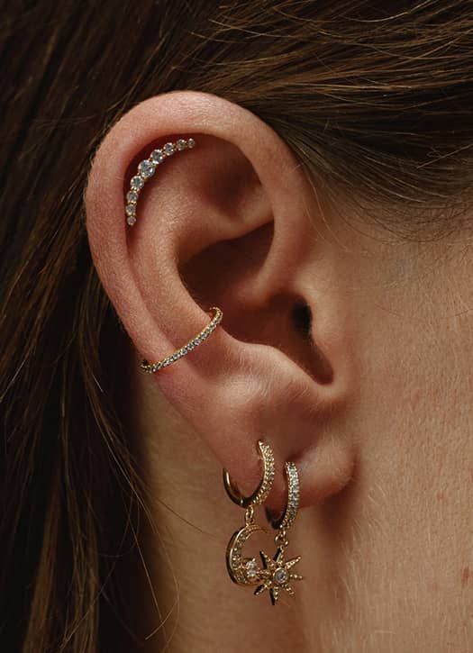 Piercings élégants et minimalistes de la Maison Huguette à Paris.