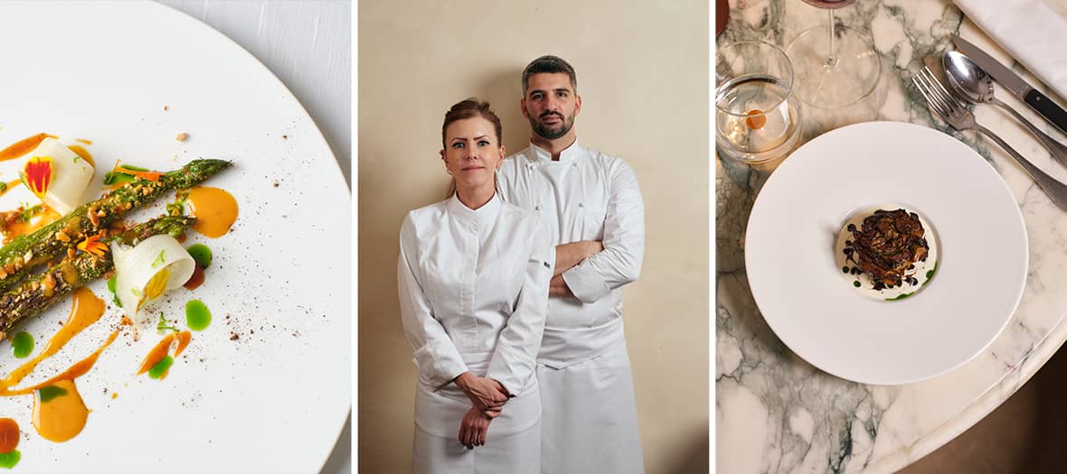 Asperges vertes et décoration florale au restaurant Amalia à Paris, avec les chefs Vanessa et Guillaume Mangeret en arrière-plan.