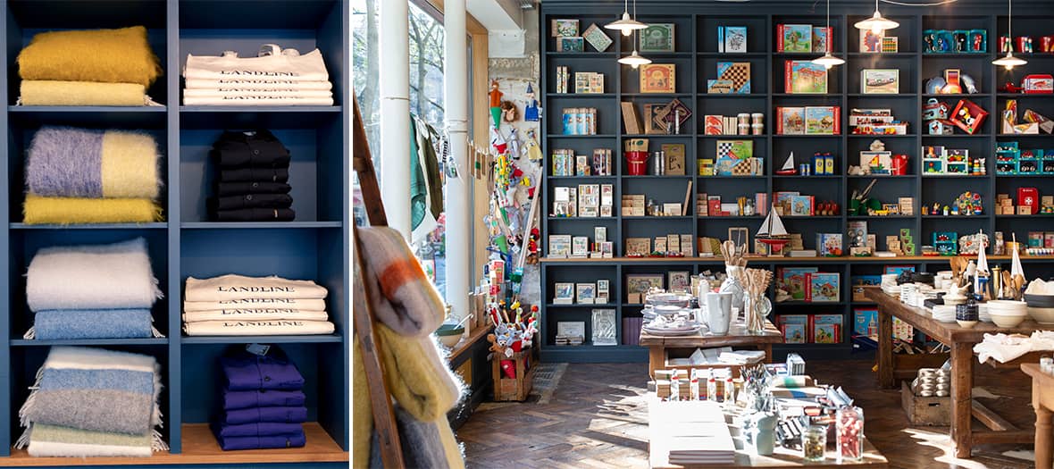 Étagères de la boutique Landline à Paris avec plaids colorés et vêtements pliés.