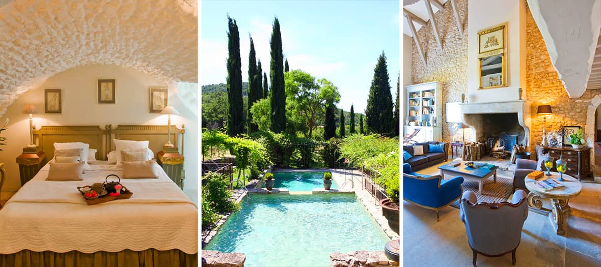 Chambre voûtée en pierre blanche avec lit double et plateau de petit déjeuner, piscine extérieure entourée de cyprès dans un jardin provençal et salon chaleureux avec cheminée en pierre, mobilier vintage et poutres apparentes à la Bastide de Marie.