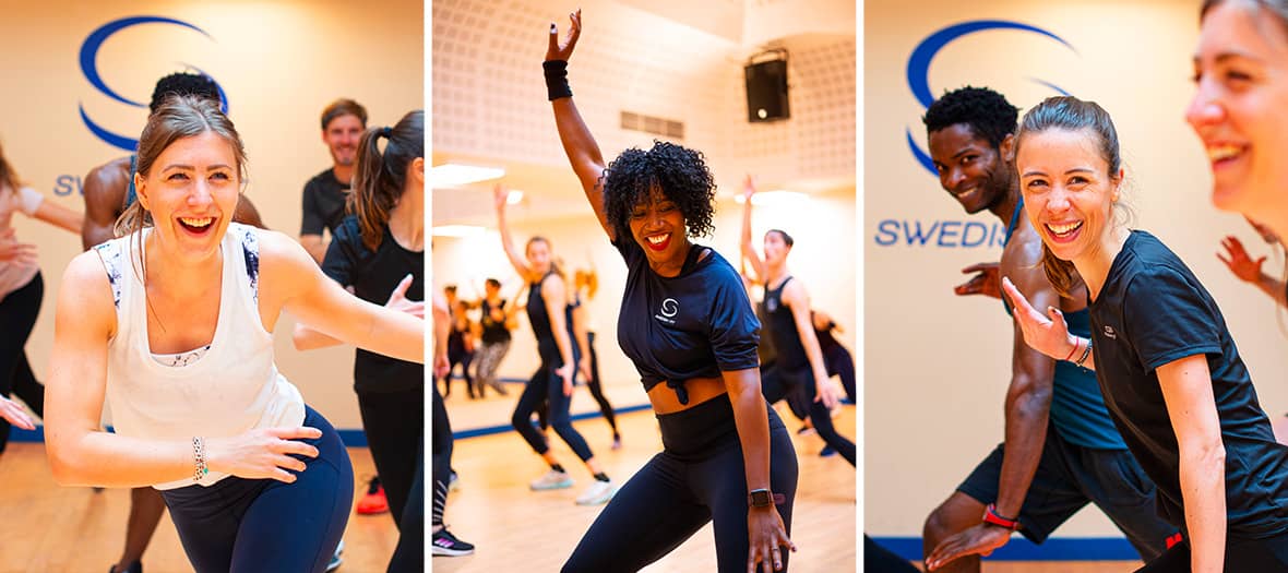 Ambiance dynamique lors d’un cours collectif Swedish Fit à Paris avec participants souriants.