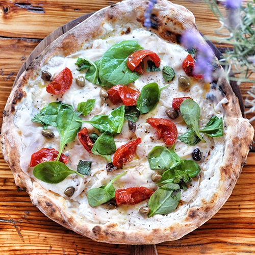  Pizza Mammargherita with buffalo mozzarella, fresh basil, juicy tomatoes from San Marzano