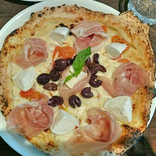 4 cheese pizza with cherry tomatoes, San Daniele and bufala